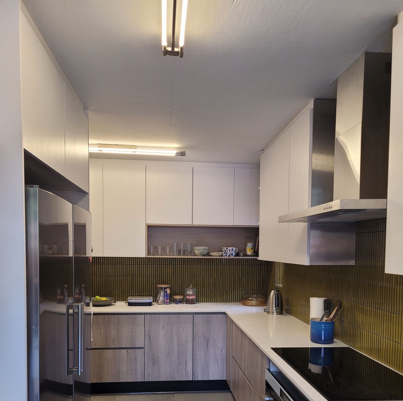 The renovated U-shaped kitchen